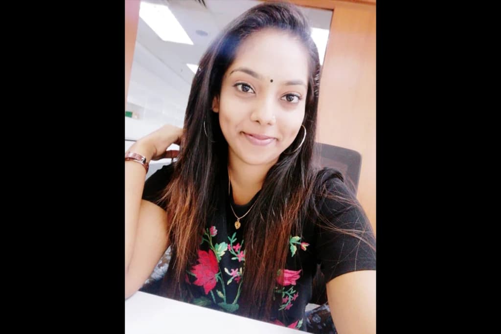 MiHCM colleague wearing a floral top
