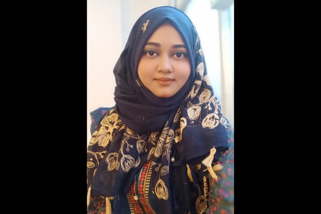 MiHCM colleague wearing a blue headscarf